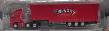 Load image into Gallery viewer, 1:50 Volvo Prime mover &amp; Curtain Side Trailer (Arnotts)
