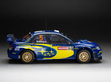 Load image into Gallery viewer, 1:18 Subaru Impreza WRC06 – #5 P.Solberg/P.Mills – 3th Wales Rally GB 2006
