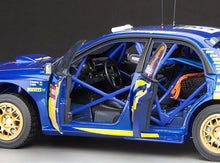 Load image into Gallery viewer, 1:18 Subaru Impreza WRC06 – #5 P.Solberg/P.Mills – 3th Wales Rally GB 2006
