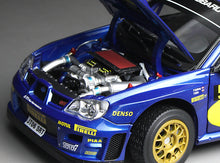 Load image into Gallery viewer, 1:18 Subaru Impreza WRC06 – #5 P.Solberg/P.Mills – 3th Wales Rally GB 2006
