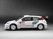 Load image into Gallery viewer, 1:18 Ford Focus RS WRC’03 - #1 O.Tänak/K.Sikk - Winner 2011 Saarema Rally
