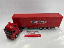 Load image into Gallery viewer, 1:50 Volvo Prime mover &amp; Curtain Side Trailer (Arnotts)
