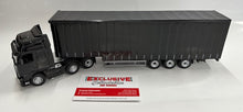 Load image into Gallery viewer, 1:50 Volvo Prime mover &amp; Curtain Side Trailer (Black)
