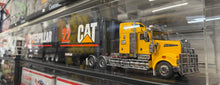 Load image into Gallery viewer, 1:32 Kenworth T909 B Double - Cat 22 (Black &amp; Yellow)

