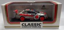 Load image into Gallery viewer, 1:64 Holden VE Commodore Series II 2012 TeamVodafone Jamie Whincup Championship Win
